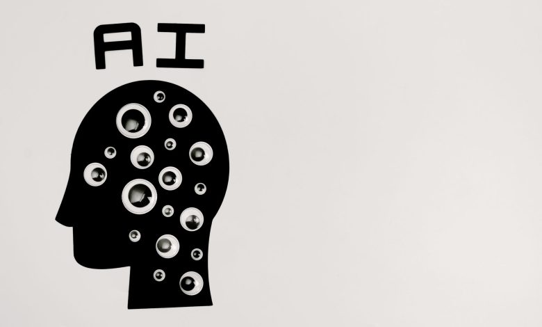 Silhueta de uma cabeça humana preenchida por olhos, em uma representação abstrata da inteligência artificial e da tecnologia.